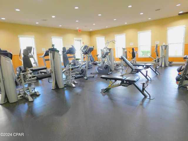 exercise room featuring a wealth of natural light and recessed lighting