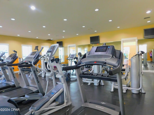 workout area with visible vents and recessed lighting