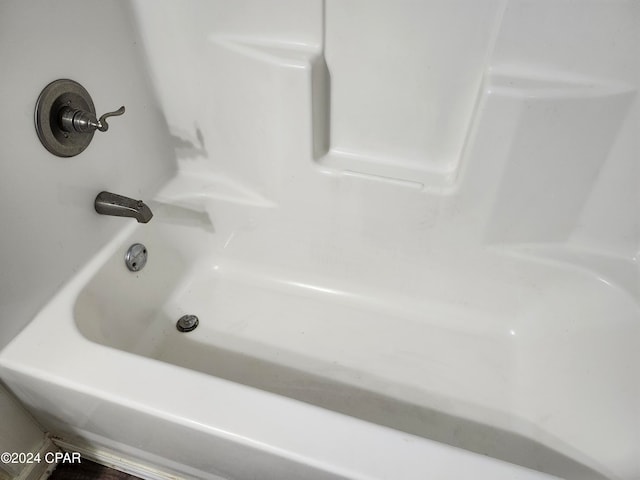 bathroom with a washtub