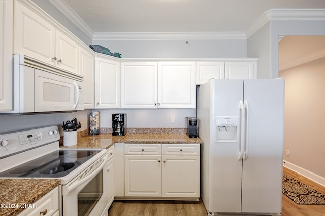 kitchen featuring white cabinets, ornamental molding, white appliances, and light wood-type flooring