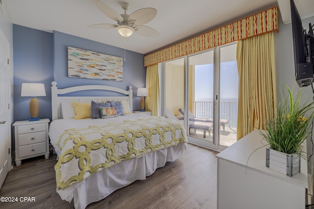 bedroom with dark hardwood / wood-style floors, ceiling fan, access to exterior, and multiple windows