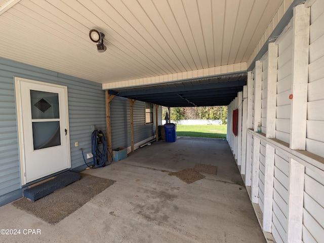 view of patio / terrace with a carport