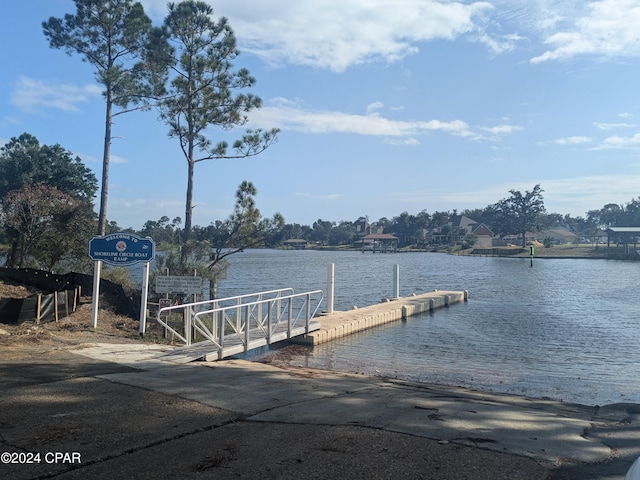 view of dock with a water view