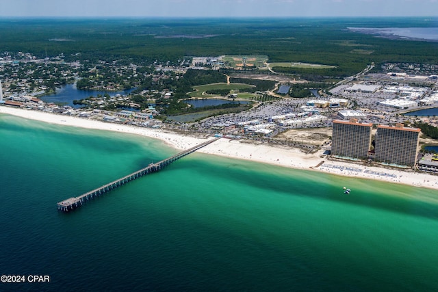 bird's eye view with a water view and a view of the beach