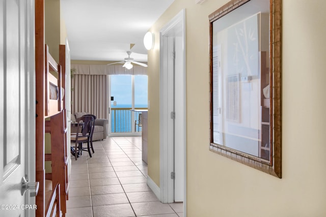 hallway with light tile patterned flooring