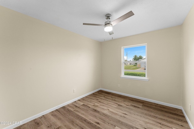 736 E Pine Forest Dr, Lynn Haven, FL 32444 - unfurnished room with light wood-type flooring, baseboards, and a ceiling fan