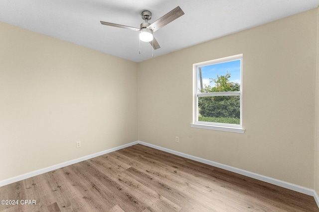 736 E Pine Forest Dr, Lynn Haven, FL 32444 - unfurnished room with light wood-type flooring, baseboards, and ceiling fan