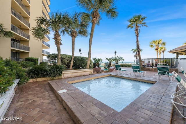 pool with a patio