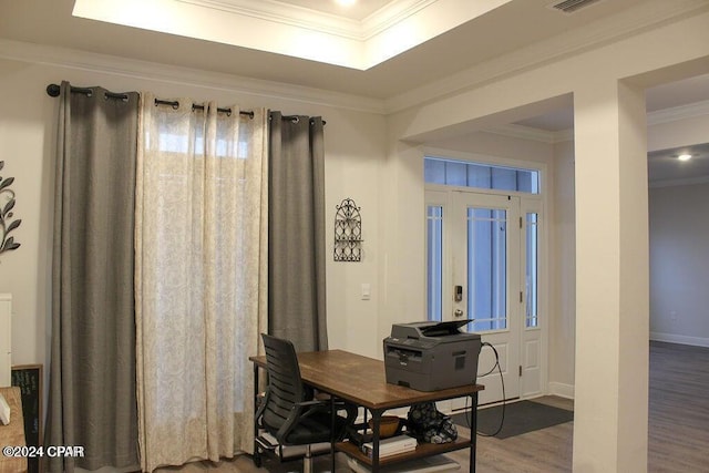 home office featuring hardwood / wood-style floors and ornamental molding