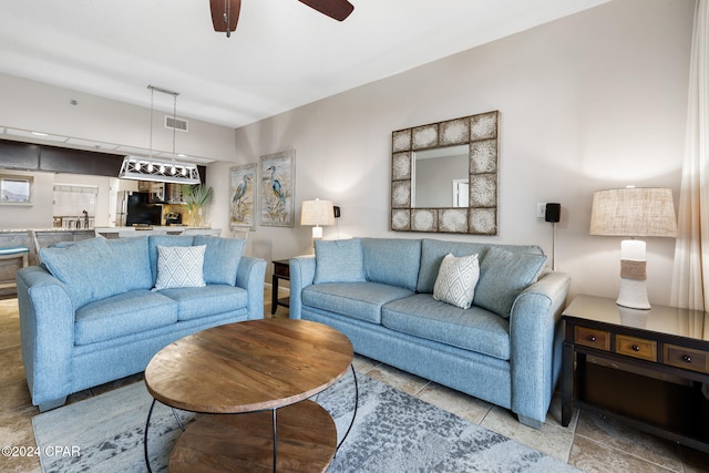 living room featuring ceiling fan