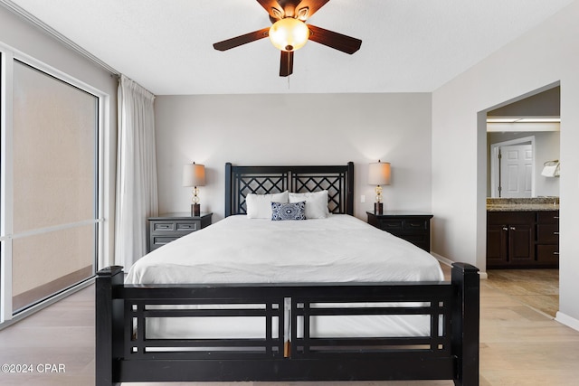 10254 E County Highway 30a Unit 333, Rosemary Beach, FL 32461 - bedroom featuring light wood-style floors, a ceiling fan, and ensuite bathroom