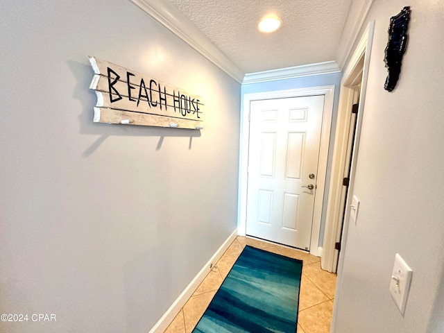 doorway to outside featuring crown molding, a textured ceiling, and light tile patterned floors