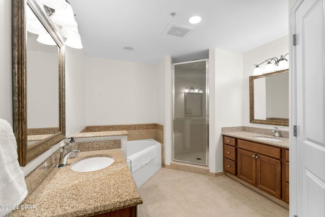 bathroom featuring vanity, plus walk in shower, and tile patterned floors