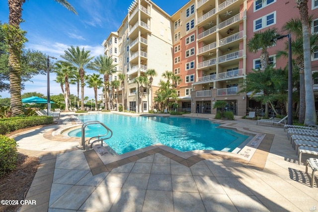view of pool featuring a patio area