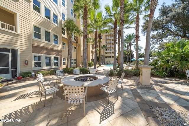 view of patio featuring a fire pit