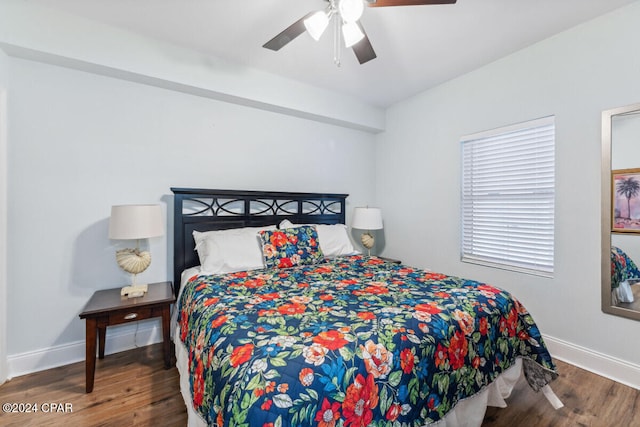 bedroom featuring dark wood-type flooring and ceiling fan