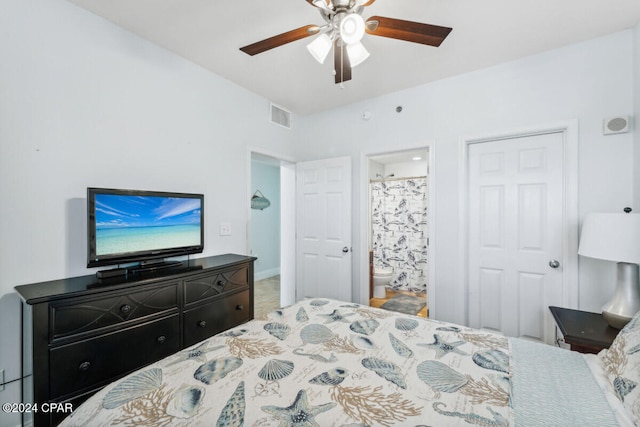 bedroom with ensuite bathroom and ceiling fan