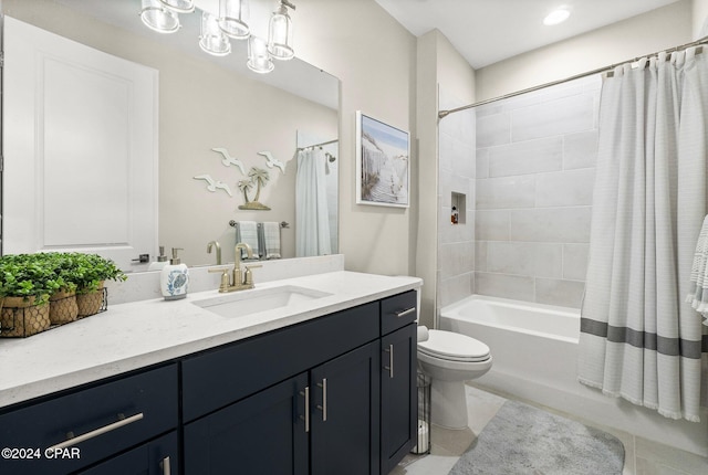 full bathroom featuring tile patterned flooring, vanity, toilet, and shower / bath combo with shower curtain