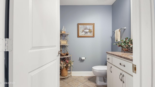 8700 Front Beach Rd Unit 4216, Panama City Beach, FL 32407 - half bathroom featuring tile patterned flooring, toilet, vanity, and baseboards