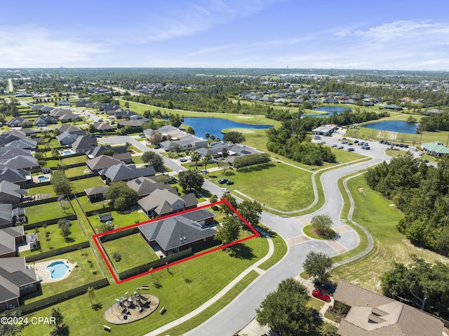 birds eye view of property featuring a water view