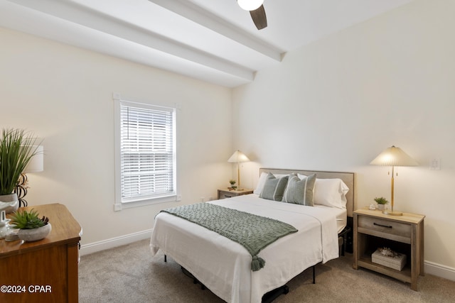 bedroom featuring ceiling fan and light carpet