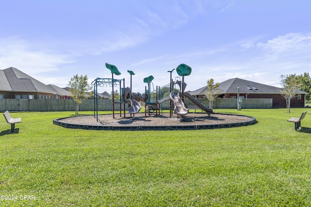 view of play area featuring a lawn