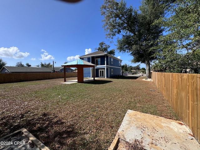 view of yard with a gazebo and a patio area