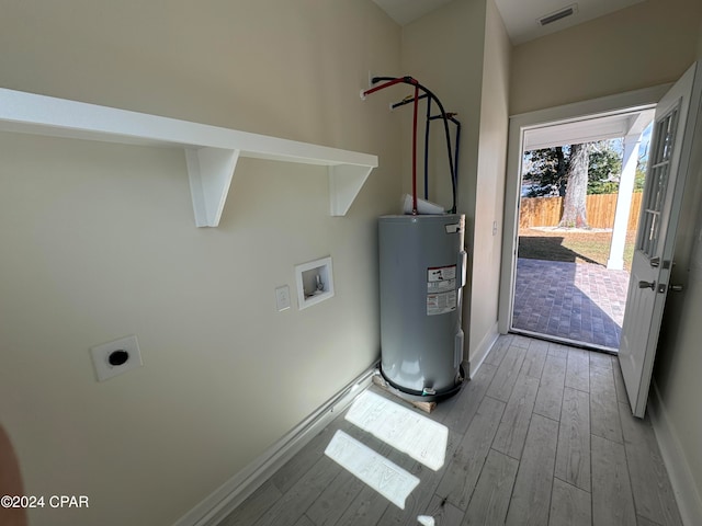 clothes washing area featuring hookup for a washing machine, light wood-type flooring, hookup for an electric dryer, and water heater