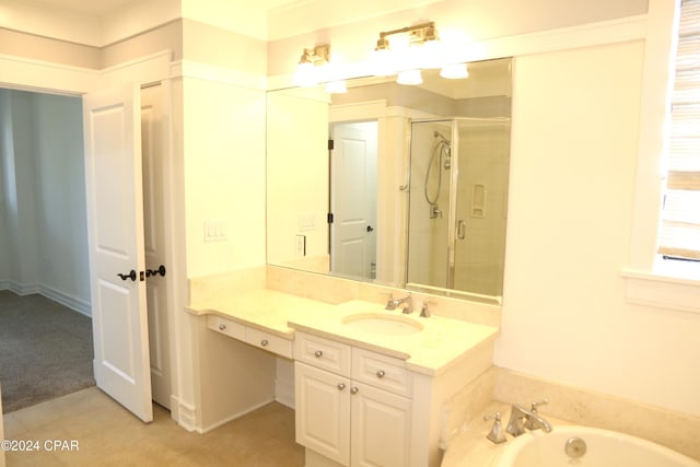 bathroom featuring vanity, plus walk in shower, and tile patterned flooring