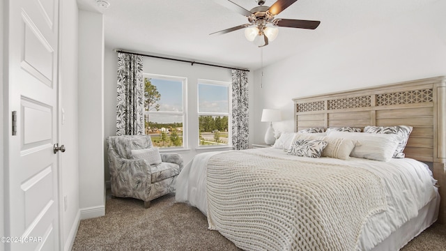 bedroom with ceiling fan and carpet flooring