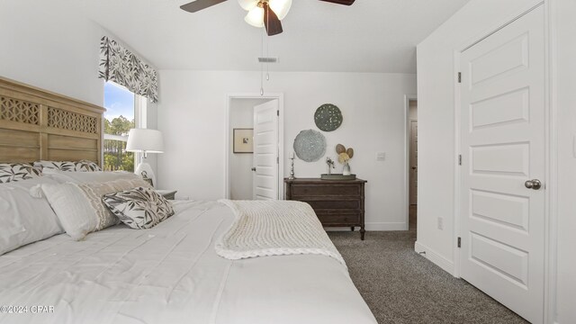 bedroom featuring ceiling fan and carpet floors