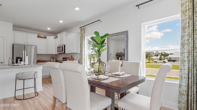 dining area featuring light hardwood / wood-style floors