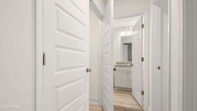 hall featuring light hardwood / wood-style floors