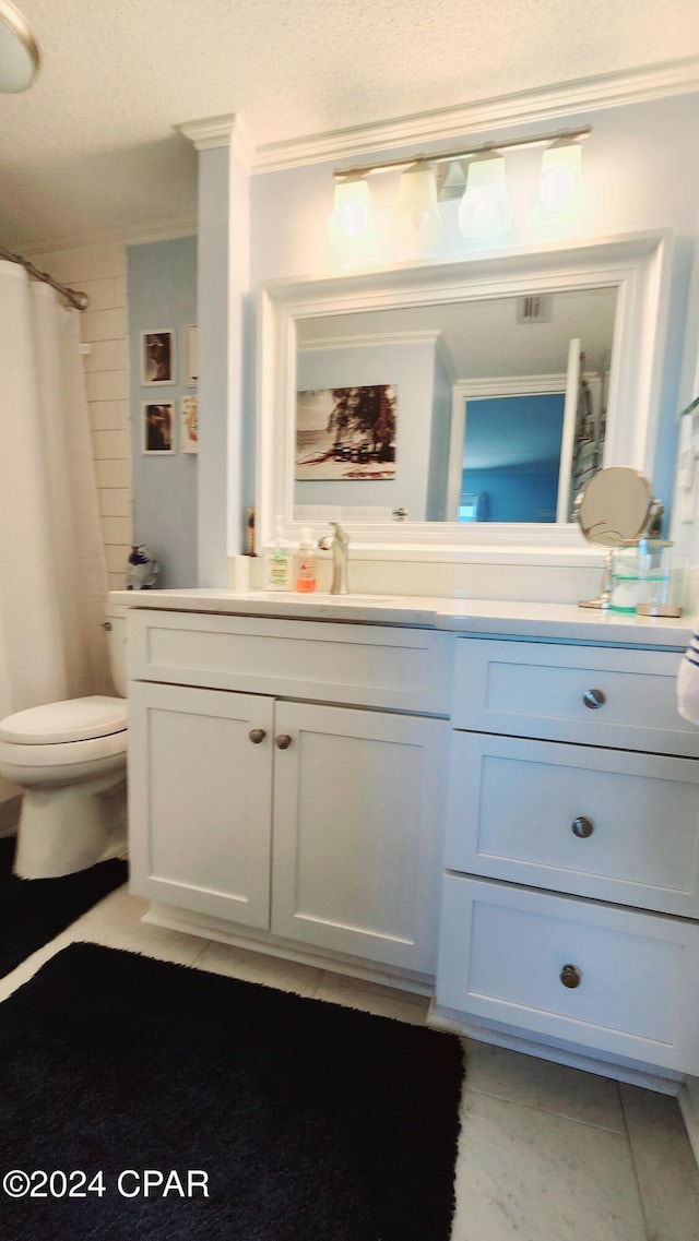 bathroom with vanity, ornamental molding, toilet, and a shower with shower curtain