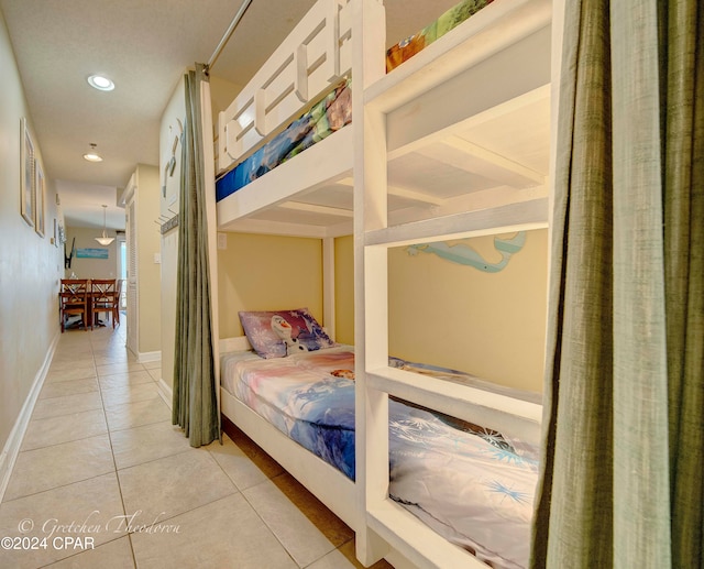 unfurnished bedroom featuring light tile patterned floors