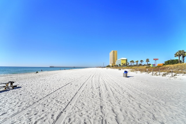 property view of water featuring a beach view