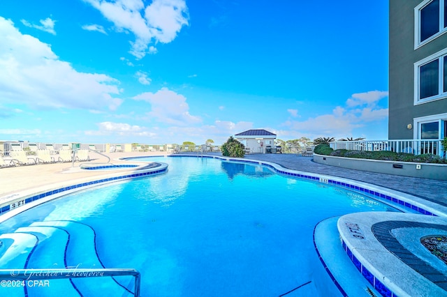 view of pool with a patio