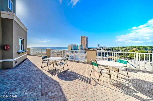 view of patio / terrace featuring a water view