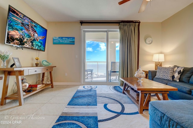 tiled living room with ceiling fan