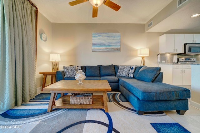 living room featuring ceiling fan