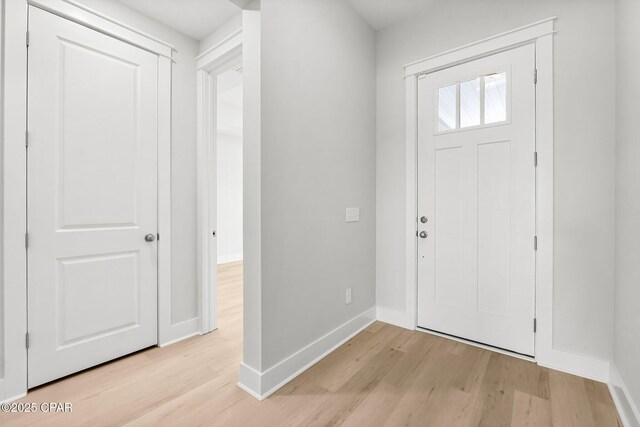 spacious closet with hardwood / wood-style flooring