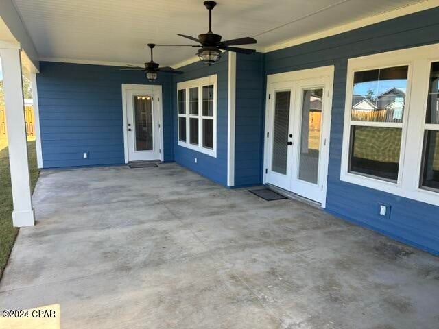 view of patio with ceiling fan and french doors