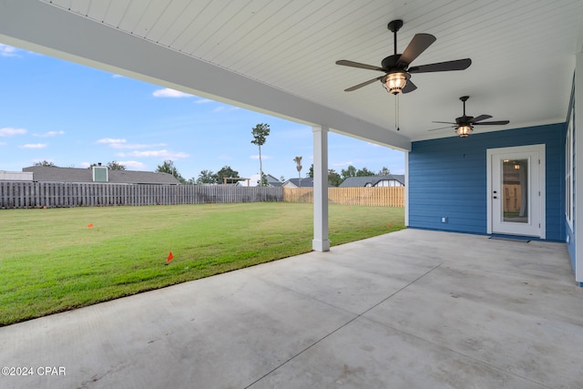 view of patio featuring ceiling fan