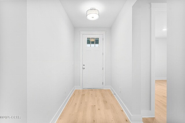 washroom with washer hookup, hardwood / wood-style flooring, and hookup for an electric dryer