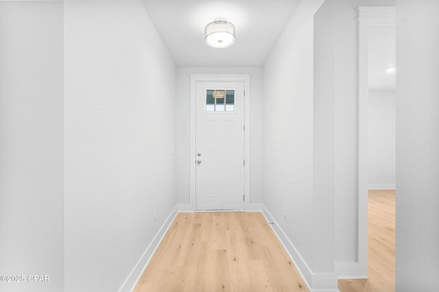 doorway to outside featuring light hardwood / wood-style flooring