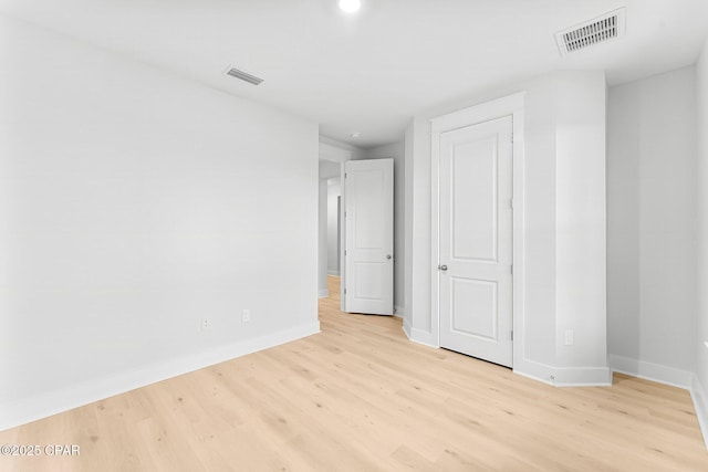 unfurnished bedroom with light hardwood / wood-style floors