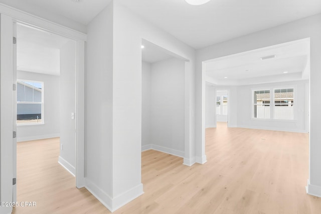 corridor featuring light hardwood / wood-style flooring