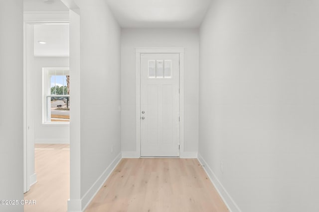 doorway to outside featuring light hardwood / wood-style flooring