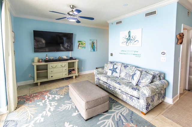 living room featuring ceiling fan, light tile patterned floors, and ornamental molding