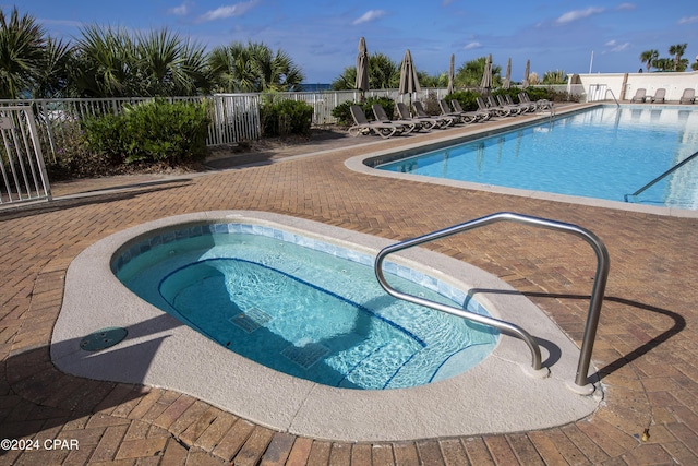 view of pool featuring a patio area